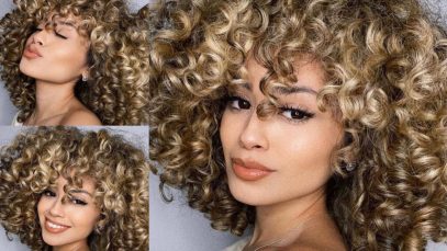 Capelli ricci, taglio medio con frangia