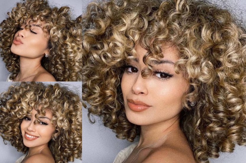 Capelli ricci, taglio medio con frangia
